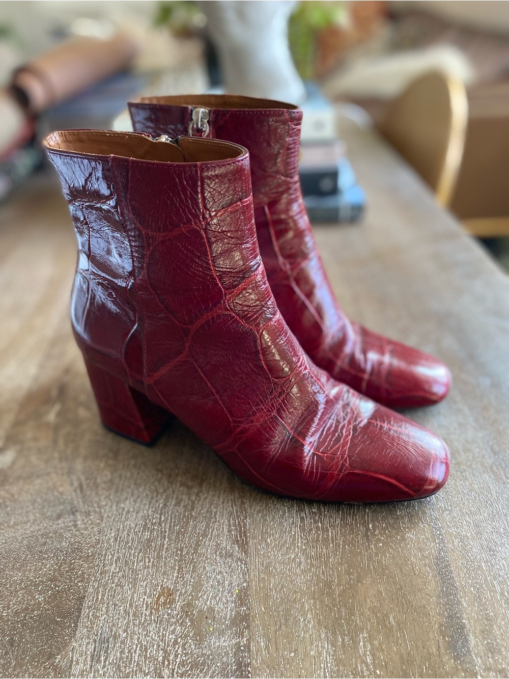 Freda Salvador croc-embossed leather ankle boots in bordeaux red.